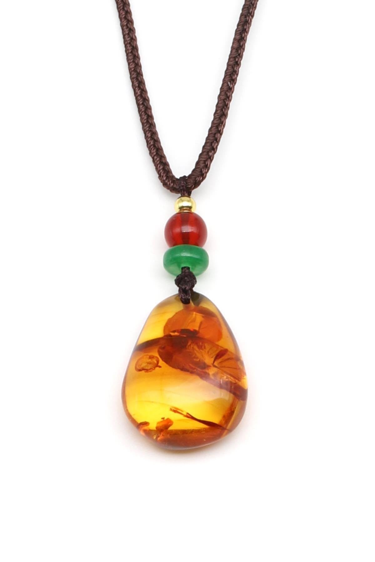 Damla Kehribar Siyah İpli Kolye – 18 × 26 mm | 38 cm | 4 gr
