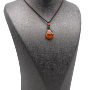 Damla Kehribar Siyah İpli Kolye – 18 × 26 mm | 38 cm | 4 gr