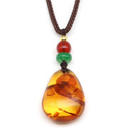 Damla Kehribar Siyah İpli Kolye – 18 × 26 mm | 38 cm | 4 gr